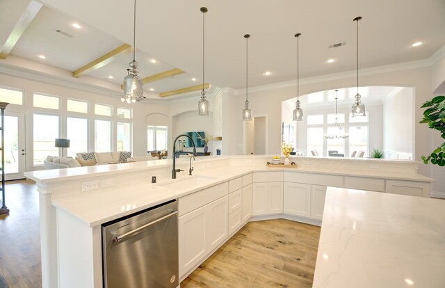 12607 Smokey Sunset Ct, Cypress, TX 77433 - kitchen featuring dishwasher, open floor plan, light wood-style flooring, crown molding, and healthy amount of natural light