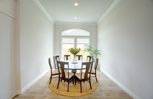 12607 Smokey Sunset Ct, Cypress, TX 77433 - dining area featuring ornamental molding, light wood-style flooring, and recessed lighting