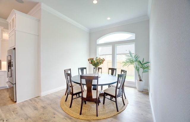12607 Smokey Sunset Ct, Cypress, TX 77433 - dining room featuring crown molding, light wood-style floors, and recessed lighting