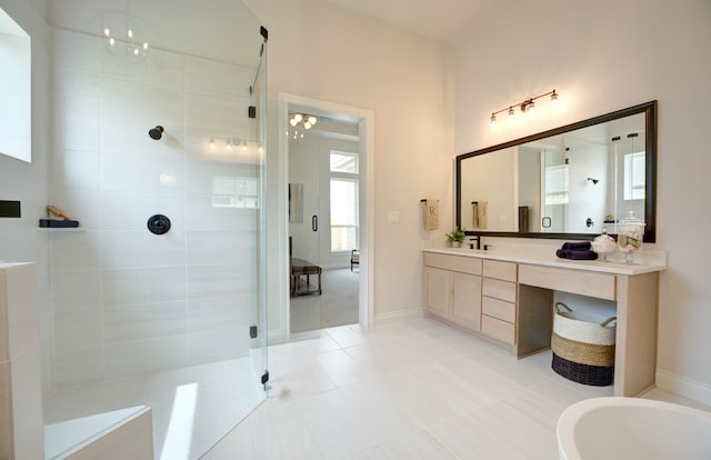 12607 Smokey Sunset Ct, Cypress, TX 77433 - full bathroom with walk in shower, vanity, and healthy amount of natural light
