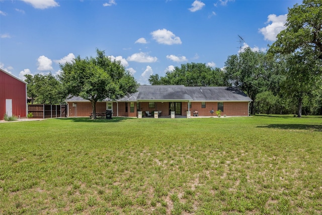 3135 Forest Hill E Rd, La Grange, TX 78945 - back of house featuring brick siding
