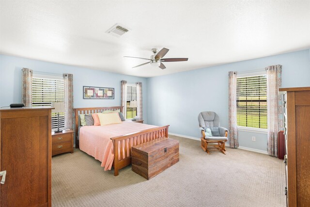 3135 Forest Hill E Rd, La Grange, TX 78945 - bedroom featuring light colored carpet and ceiling fan