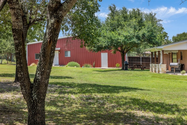 3135 Forest Hill E Rd, La Grange, TX 78945 - view of yard with a pole building, an outdoor structure, and a patio area