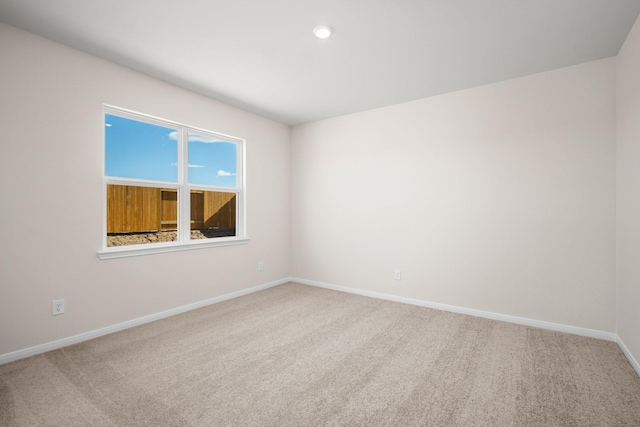 384 Tejas Trl, Waller, TX 77484 - carpeted empty room with baseboards and recessed lighting