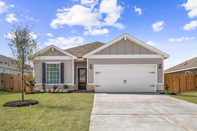 384 Tejas Trl, Waller, TX 77484 - view of front of house with driveway, stone siding, board and batten siding, an attached garage, and a shingled roof