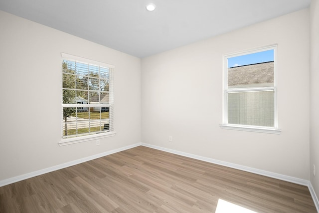 384 Tejas Trl, Waller, TX 77484 - spare room featuring wood finished floors and baseboards