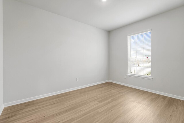 384 Tejas Trl, Waller, TX 77484 - empty room with light wood-style floors and baseboards
