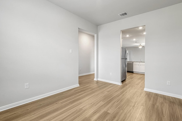 384 Tejas Trl, Waller, TX 77484 - empty room featuring light wood-style floors and ceiling fan