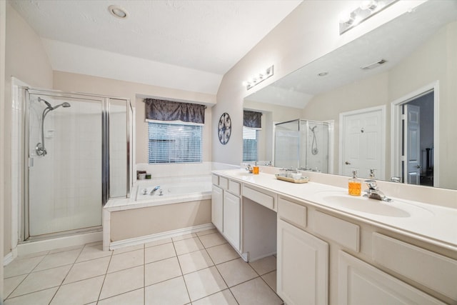 3732 Coral Reef Dr, Seabrook, TX 77586 - bathroom with a shower stall, double vanity, a bath, tile patterned flooring, and lofted ceiling