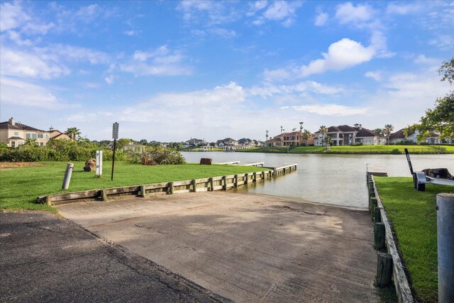 3732 Coral Reef Dr, Seabrook, TX 77586 - view of home's community featuring a boat ramp, a residential view, a water view, a yard, and a boat dock