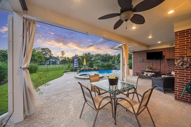 3732 Coral Reef Dr, Seabrook, TX 77586 - view of patio / terrace featuring a ceiling fan, a pool with connected hot tub, and outdoor dining space