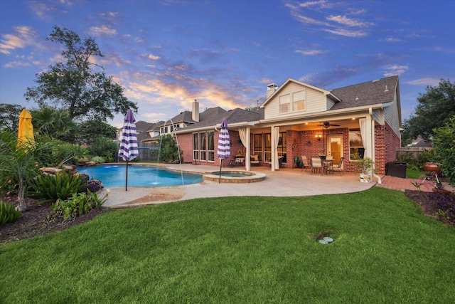 3732 Coral Reef Dr, Seabrook, TX 77586 - view of swimming pool featuring a ceiling fan, a patio area, and a pool with connected hot tub