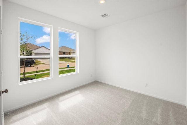 2435 Rooke Rd, Bryan, TX 77807 - unfurnished room with carpet floors and recessed lighting