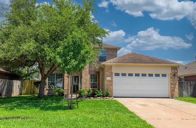 4126 Winesap Bend Dr, Stafford, TX 77477 - view of front of house featuring driveway, brick siding, and an attached garage