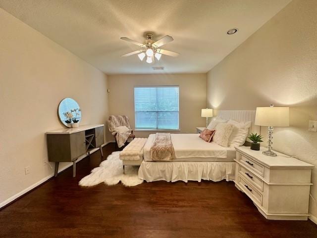 4126 Winesap Bend Dr, Stafford, TX 77477 - bedroom with dark wood-style floors and a ceiling fan