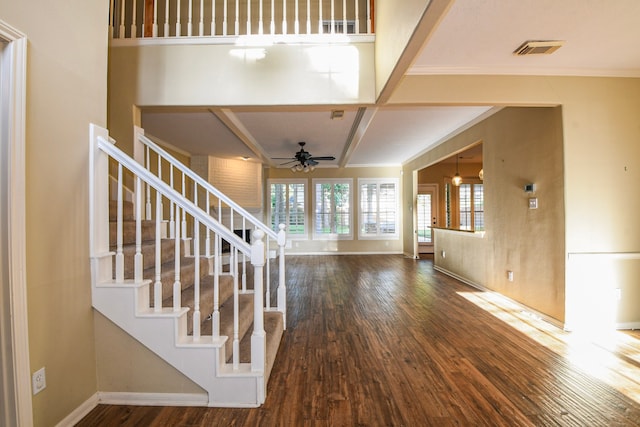 5838 Mountain View Dr, Houston, TX 77345 - entrance foyer with wood finished floors, ceiling fan, stairway, coffered ceiling, and beam ceiling