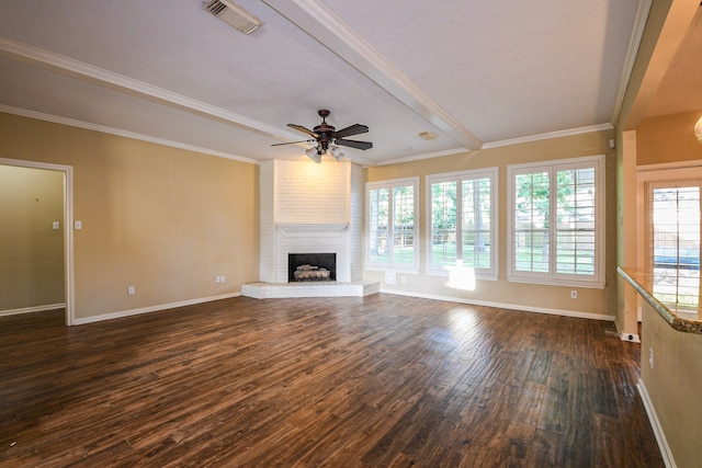 5838 Mountain View Dr, Houston, TX 77345 - unfurnished living room featuring a ceiling fan, dark wood finished floors, a fireplace, beamed ceiling, and crown molding
