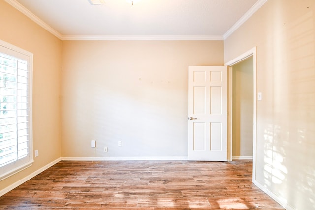 5838 Mountain View Dr, Houston, TX 77345 - unfurnished room featuring crown molding and wood finished floors