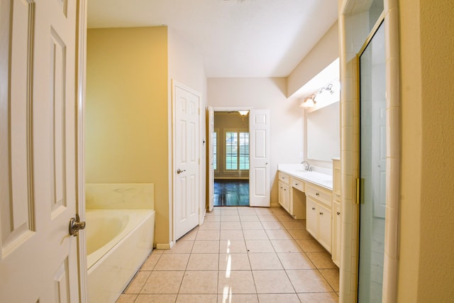 5838 Mountain View Dr, Houston, TX 77345 - bathroom featuring vanity, a bath, tile patterned flooring, and a shower with shower door