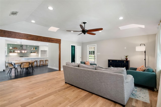 33933 Deer Creek Way, Stagecoach, TX 77355 - living room featuring a skylight, recessed lighting, ceiling fan, and wood finished floors