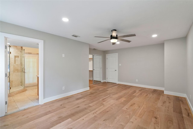 33933 Deer Creek Way, Stagecoach, TX 77355 - spare room with ceiling fan, light wood-style flooring, and recessed lighting