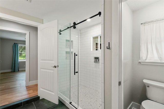 33933 Deer Creek Way, Stagecoach, TX 77355 - full bathroom with a shower stall and tile patterned flooring