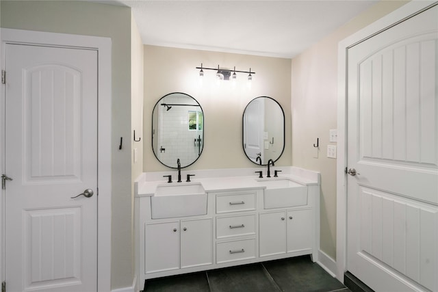 33933 Deer Creek Way, Stagecoach, TX 77355 - bathroom with double vanity, tile patterned floors, and a tile shower
