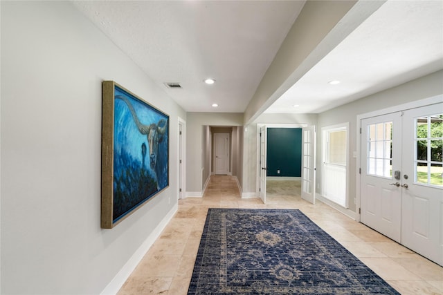 33933 Deer Creek Way, Stagecoach, TX 77355 - entryway with french doors, recessed lighting, and light tile patterned flooring