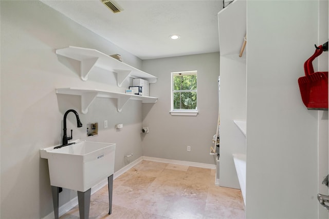 33933 Deer Creek Way, Stagecoach, TX 77355 - laundry room featuring hookup for a washing machine, electric dryer hookup, and recessed lighting