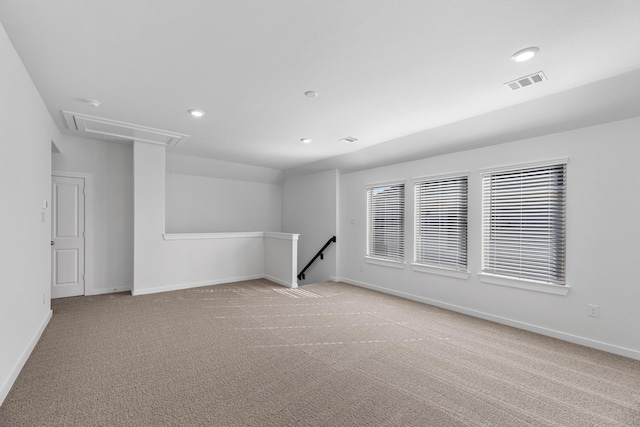 19376 Poppy Village Cir, Magnolia, TX 77355 - spare room with attic access, light carpet, and recessed lighting