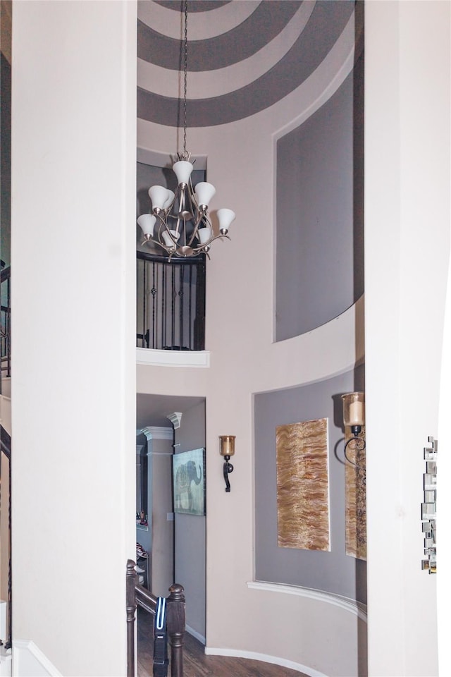 4300 Turnbridge Ct, Manvel, TX 77578 - entrance foyer featuring a towering ceiling, a chandelier, and wood finished floors