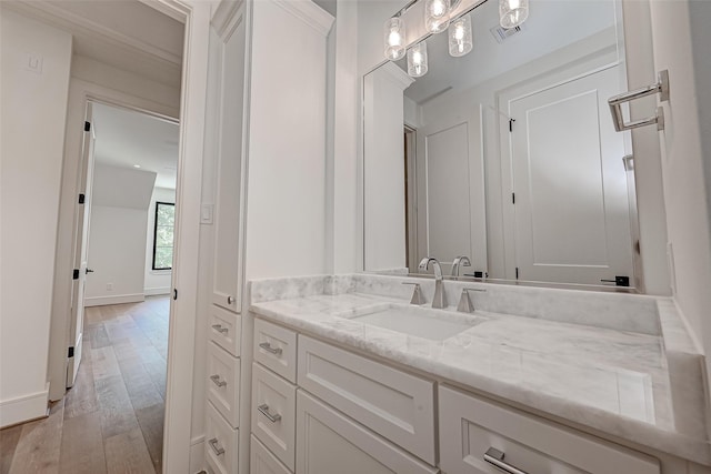 1506 W 43rd St, Houston, TX 77018 - bathroom featuring wood finished floors and vanity