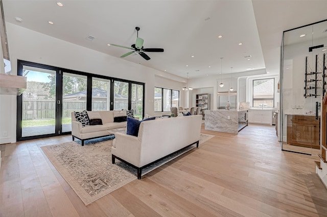 1506 W 43rd St, Houston, TX 77018 - living room featuring a ceiling fan, light wood-type flooring, and recessed lighting