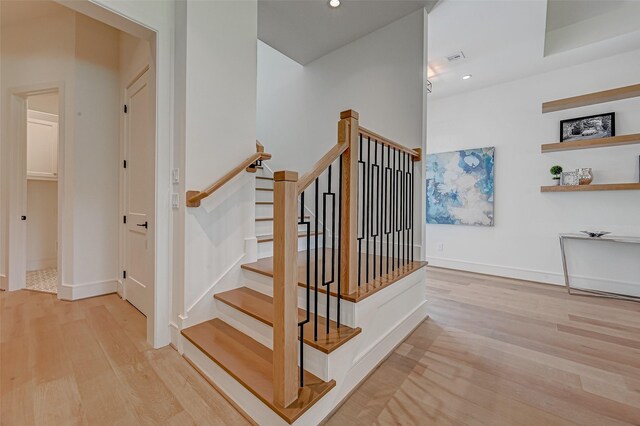 1506 W 43rd St, Houston, TX 77018 - staircase with wood finished floors and recessed lighting