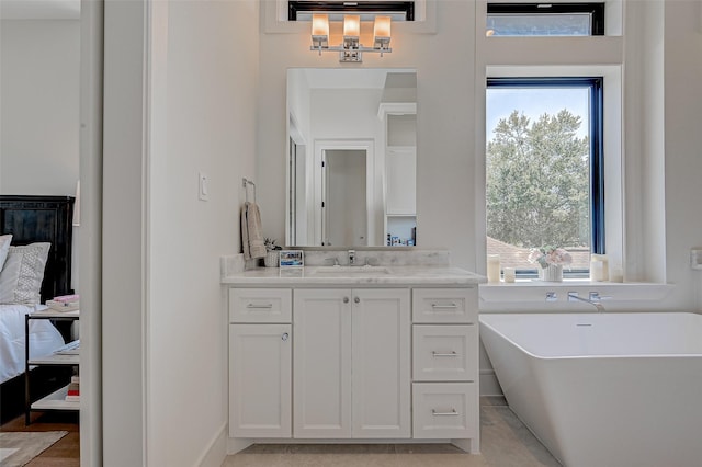 1506 W 43rd St, Houston, TX 77018 - full bath featuring vanity, healthy amount of natural light, and a freestanding bath