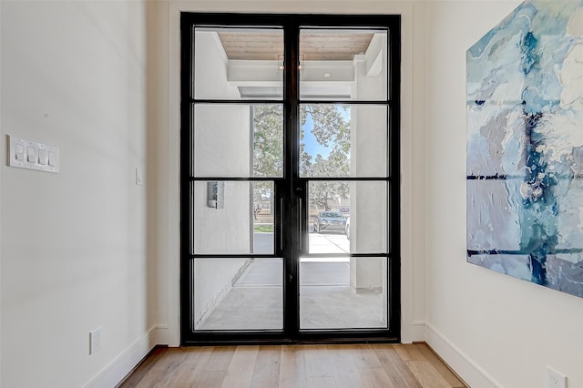 1506 W 43rd St, Houston, TX 77018 - doorway to outside with wood finished floors