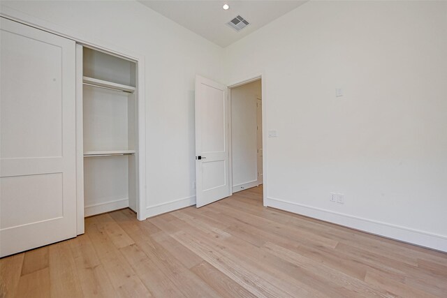 1506 W 43rd St, Houston, TX 77018 - unfurnished bedroom with light wood-style flooring and a closet