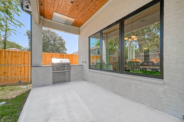 1506 W 43rd St, Houston, TX 77018 - view of patio featuring an outdoor kitchen