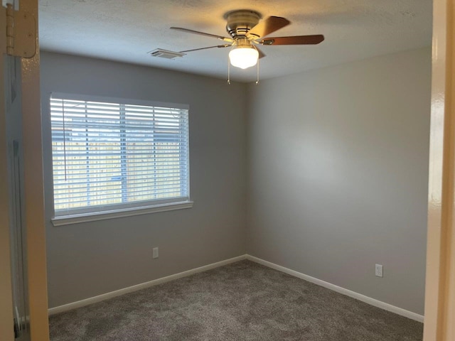 9311 Rippling Fields Dr, Houston, TX 77064 - carpeted spare room with ceiling fan and baseboards