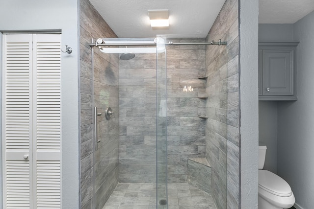 8918 James Ct, Magnolia, TX 77354 - bathroom featuring a stall shower and a closet