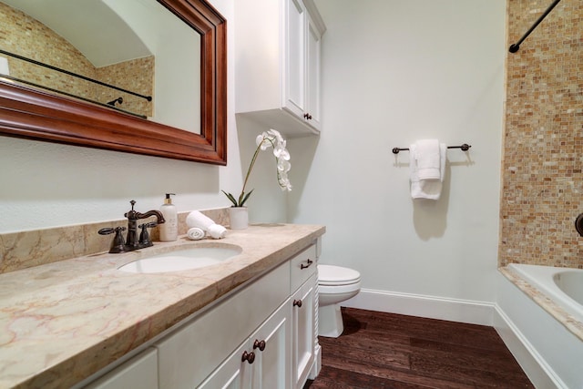 1022 W 22nd St, Houston, TX 77008 - bathroom with vanity, wood finished floors, and shower / washtub combination