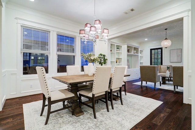1022 W 22nd St, Houston, TX 77008 - dining room featuring wood finished floors, a chandelier, ornamental molding, and recessed lighting
