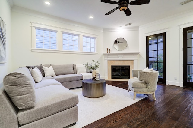 1022 W 22nd St, Houston, TX 77008 - living room with a ceiling fan, wood-type flooring, crown molding, plenty of natural light, and a glass covered fireplace