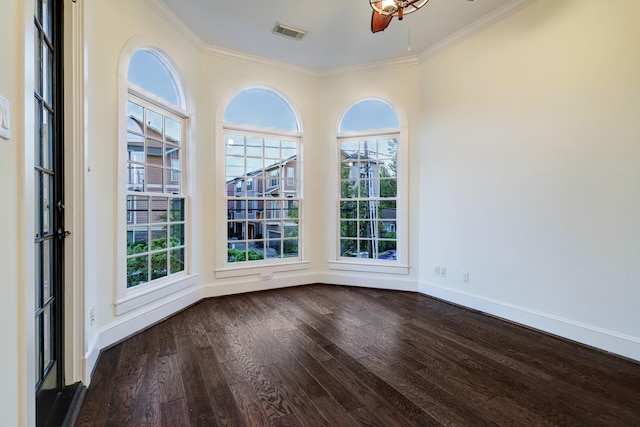 1022 W 22nd St, Houston, TX 77008 - spare room with dark wood-type flooring, crown molding, healthy amount of natural light, and a ceiling fan