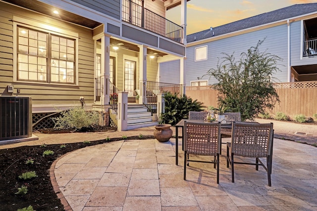 1022 W 22nd St, Houston, TX 77008 - patio terrace at dusk with outdoor dining space and a patio area