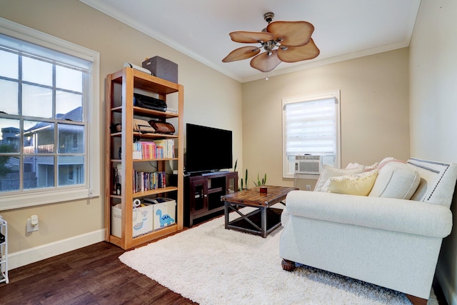 1022 W 22nd St, Houston, TX 77008 - living room with dark wood-type flooring, healthy amount of natural light, ornamental molding, a ceiling fan, and cooling unit