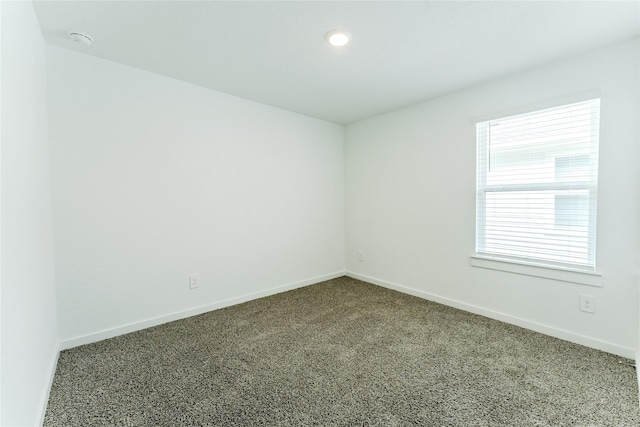 31714 Brandon Mill Trl, Fulshear, TX 77441 - unfurnished room with a smoke detector, carpet flooring, and recessed lighting