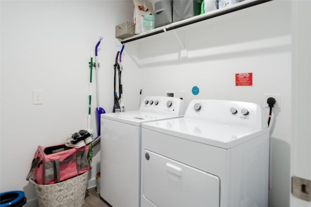 31714 Brandon Mill Trl, Fulshear, TX 77441 - laundry area with separate washer and dryer and wood finished floors