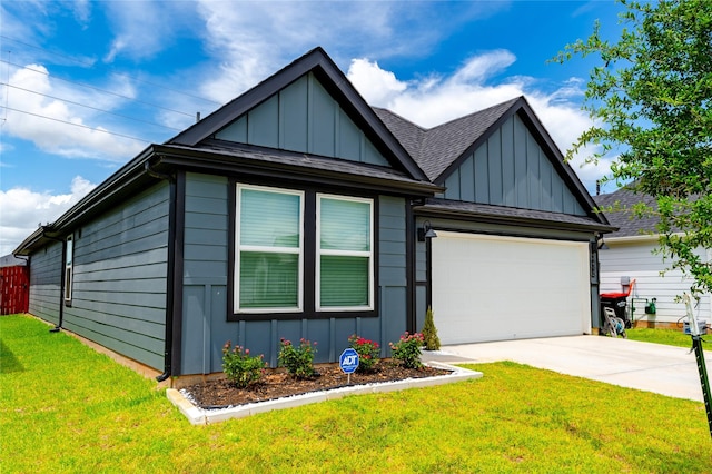 31714 Brandon Mill Trl, Fulshear, TX 77441 - view of front facade featuring board and batten siding, driveway, a garage, a shingled roof, and a front lawn
