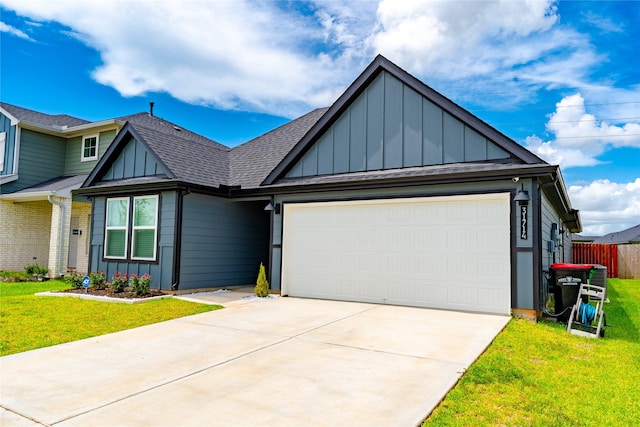 31714 Brandon Mill Trl, Fulshear, TX 77441 - view of front of home featuring board and batten siding, a shingled roof, an attached garage, and driveway
